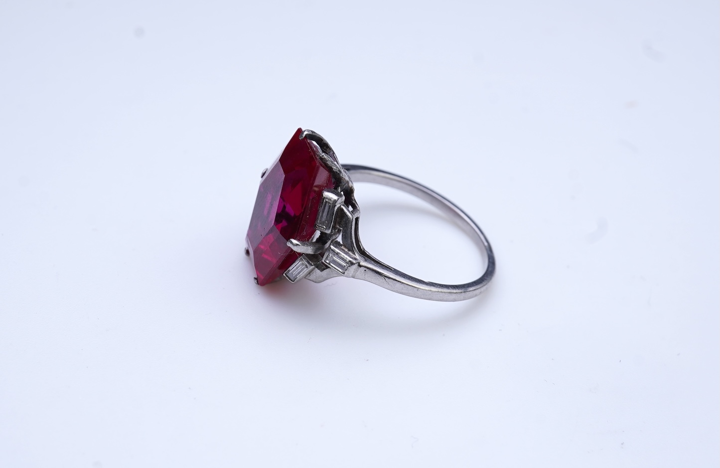 A synthetic ruby and diamond ring